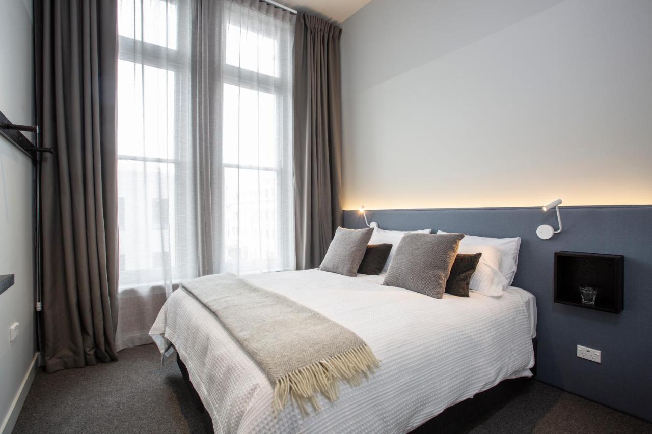 فندق The Chamberson ديوندين المظهر الخارجي الصورة A bedroom at the hotel